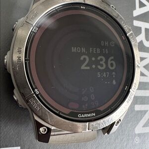Garmin Fenix 7 Pro Sapphire Solar Titanium with Fog Gray/Ember Orange Band 47mm
